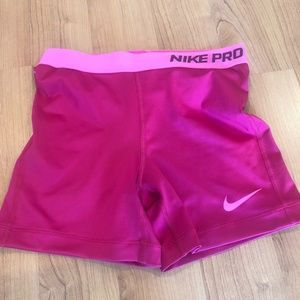 Pink Nike Pro bike shorts